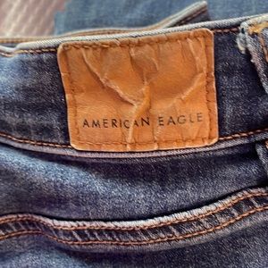 a pair of American Eagle ripped Jeans